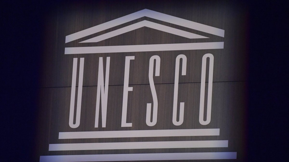 This photograph shows the logo of UNESCO during celebrations marking the 75th anniversary of the organization at its headquarters, Paris, France, Nov. 12, 2021. (AP Photo)