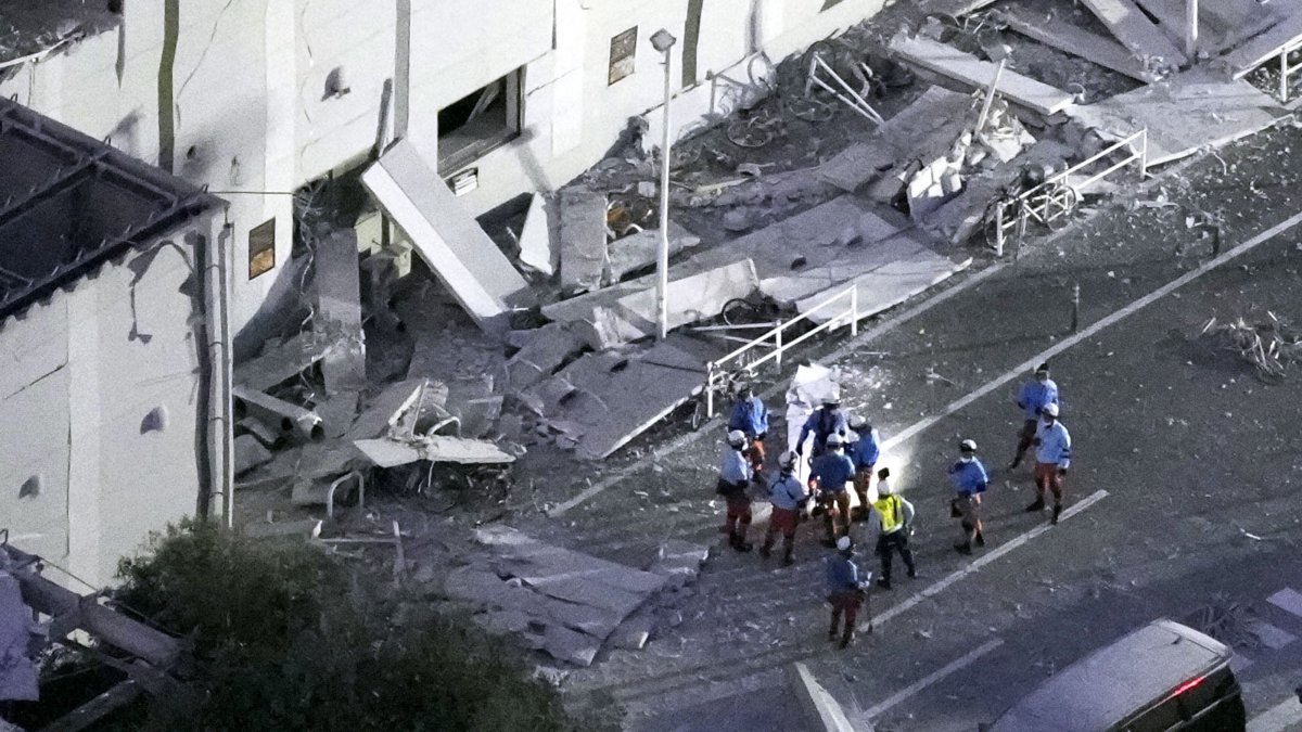 This aerial image shows rescue workers continuing the search at the damaged AEON Mall after an earthquake in Kashima, Kumamoto prefecture, southern Japan, July 28, 2026. (AP Photo)