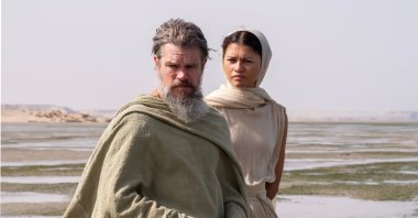 Matt Damon as Odysseus (L) and Zendaya as Athena, in a scene from "The Odyssey." (Universal Pictures via AP Photo)