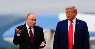 U.S. President Donald Trump and Russian President Vladimir Putin talk at Joint Base Elmendorf-Richardson, Alaska, U.S., Aug. 15, 2025. (AP Photo)
