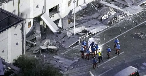 This aerial image shows rescue workers continuing the search at the damaged AEON Mall after an earthquake in Kashima, Kumamoto prefecture, southern Japan, July 28, 2026. (AP Photo)