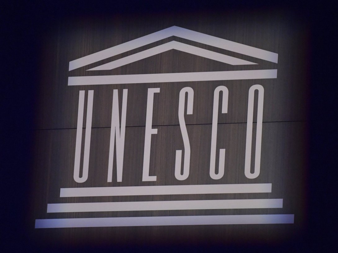 This photograph shows the logo of UNESCO during celebrations marking the 75th anniversary of the organization at its headquarters, Paris, France, Nov. 12, 2021. (AP Photo)