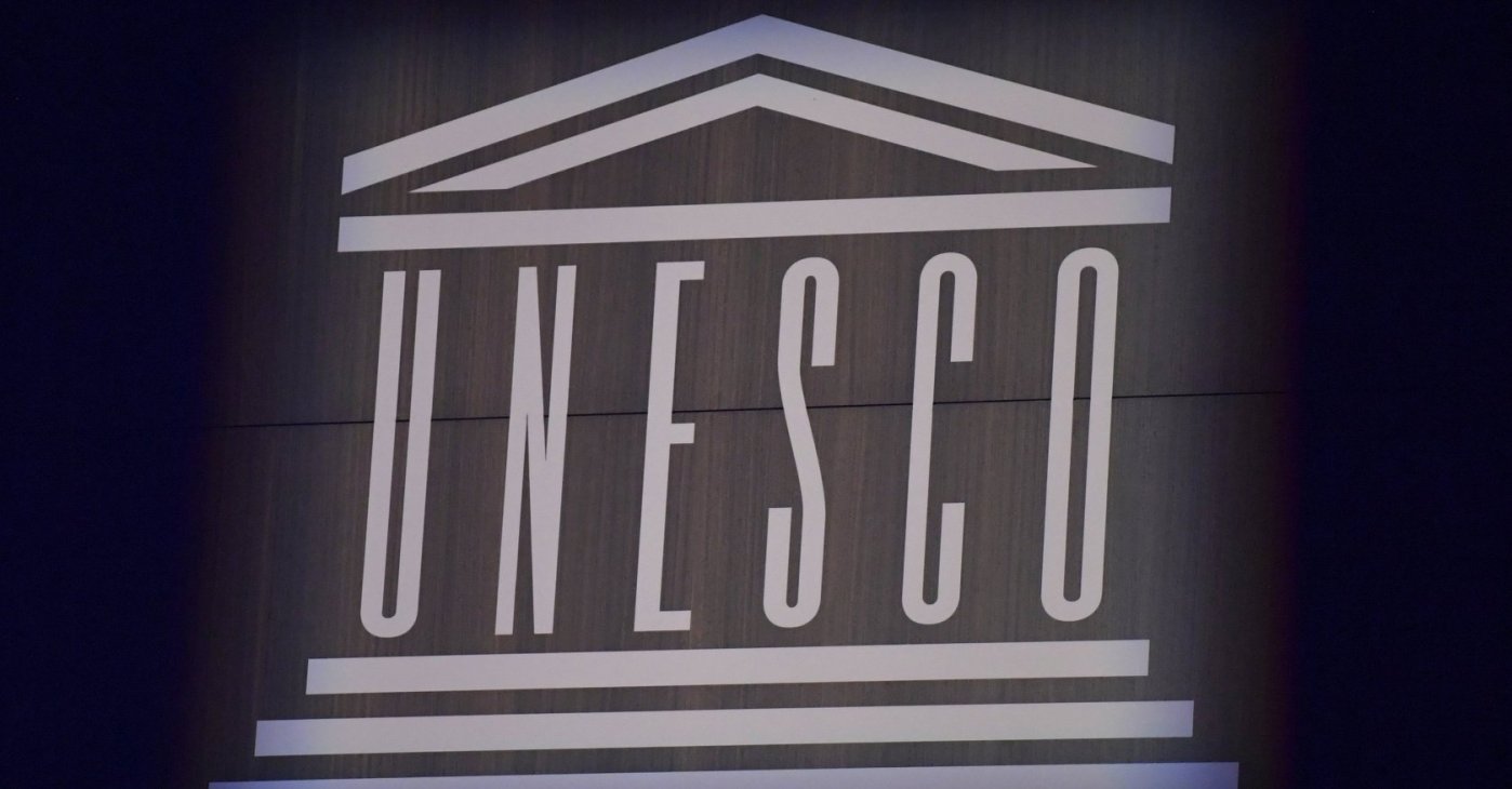 This photograph shows the logo of UNESCO during celebrations marking the 75th anniversary of the organization at its headquarters, Paris, France, Nov. 12, 2021. (AP Photo)