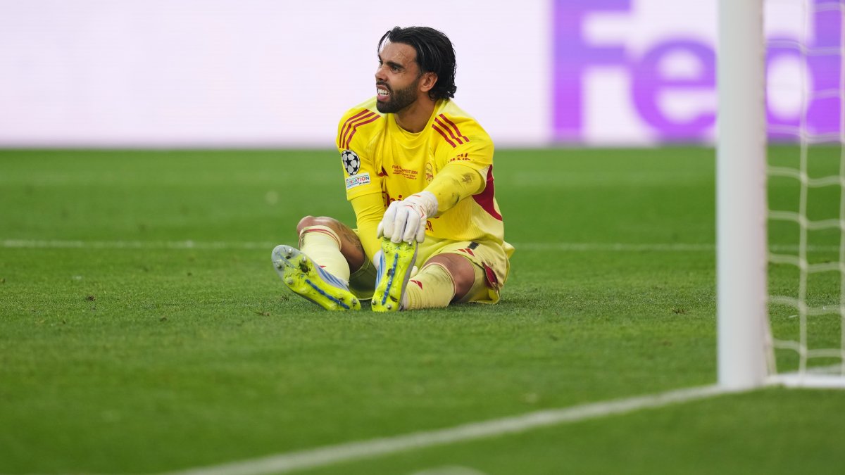 Arsenal's goalkeeper David Raya sits on the ground during the Champions League final match against Paris Saint-Germain, Budapest, Hungary, May 30, 2026. (AP Photo)