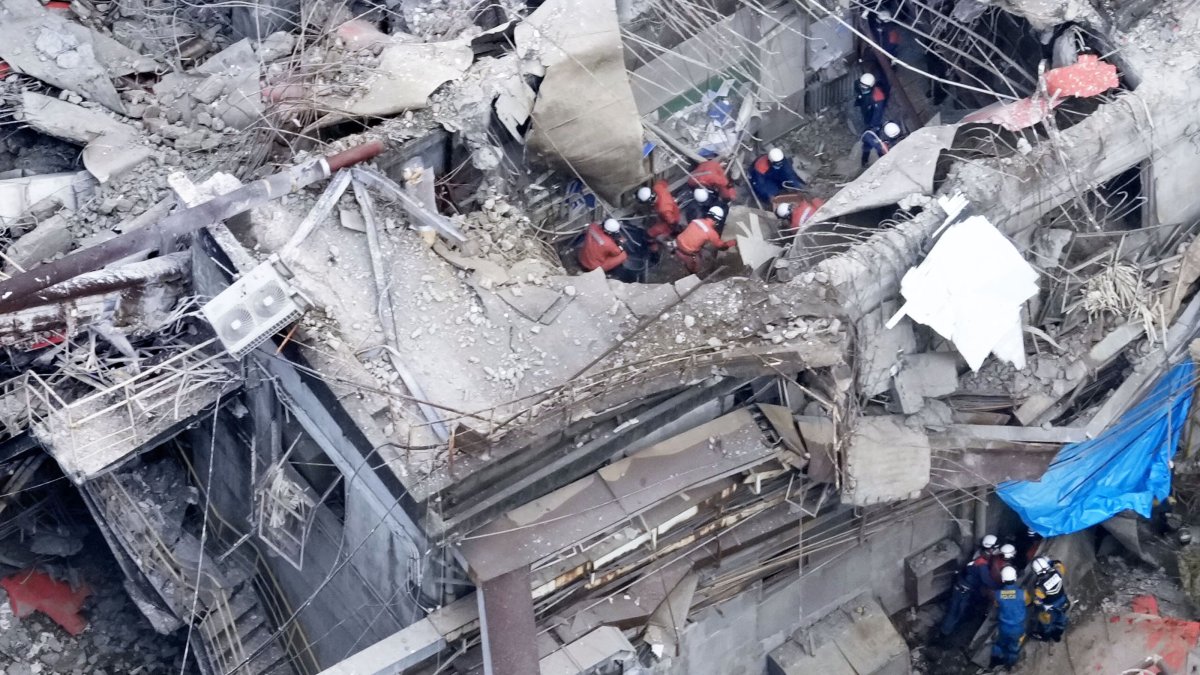 This aerial image shows a rescue operation at the Nippon Paper Industries Co.’s Yatsushiro factory, following an earthquake in Yatsushiro, Kumamoto Prefecture, July 29, 2026. (AP Photo)