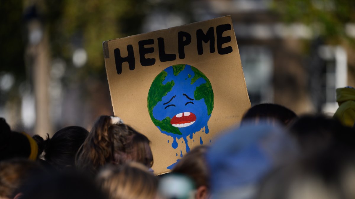 Supporters of the United Kingdom Student Climate Network (UKSCN) march through Westminster during a climate protest, London, England, U.K., Nov, 5, 2026. (Getty Images Photo)
