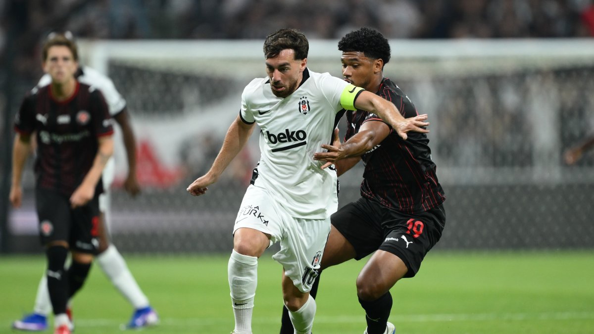 Beşiktaş's Orkun Kökçü (L) and Midtjylland's Pedro Bravo in action during the UEFA Europa League second qualifying round match against Midtjylland, Istanbul, Türkiye, July 23, 2026. (AA Photo)