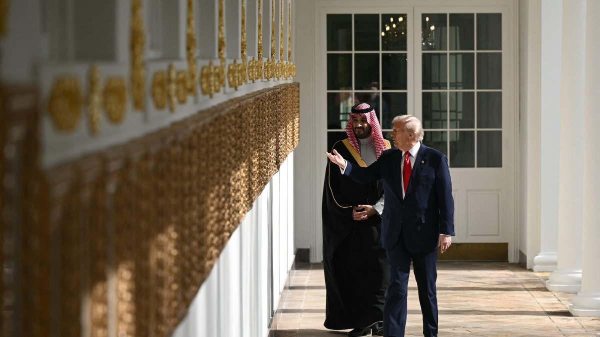 U.S. President Donald Trump (R) and Crown Prince of the Kingdom of Saudi Arabia Mohammed bin Salman walk down the Colonnade of the White House, Washington, U.S., Nov. 18, 2025. (AFP Photo)