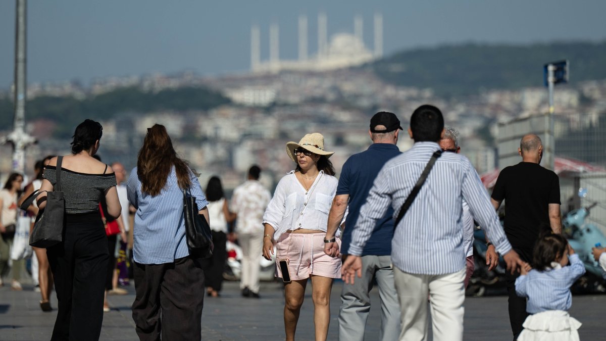 Residents and tourists make their way through Eminönü, Istanbul, Türkiye, July 28, 2026. (AA Photo) 