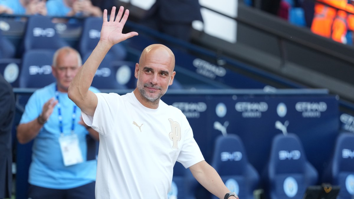 Manchester City's head coach Pep Guardiola waves to the fans after the last game with the club after a Premier League match between Manchester City and Aston Villa, Manchester, England, May 24, 2026. (AP Photo)