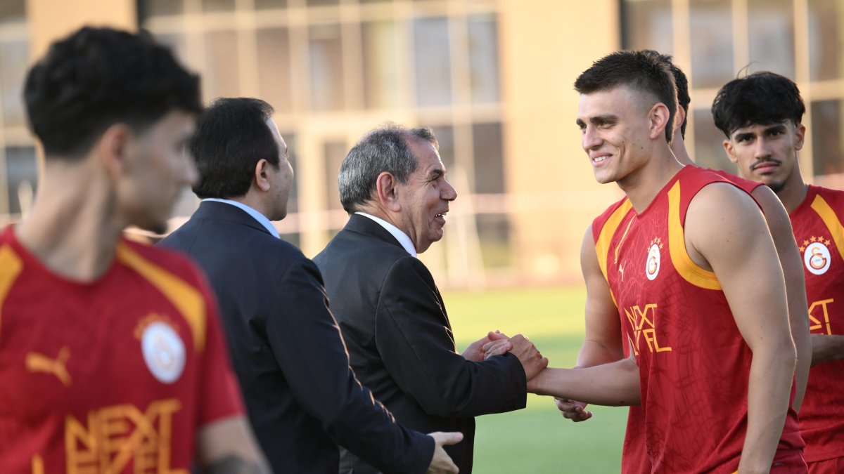 Galatasaray President Dursun Özbek (C) greets players at Kemerburgaz Metin Oktay Facilities, Istanbul, Türkiye, July 7, 2026. (AA Photo)