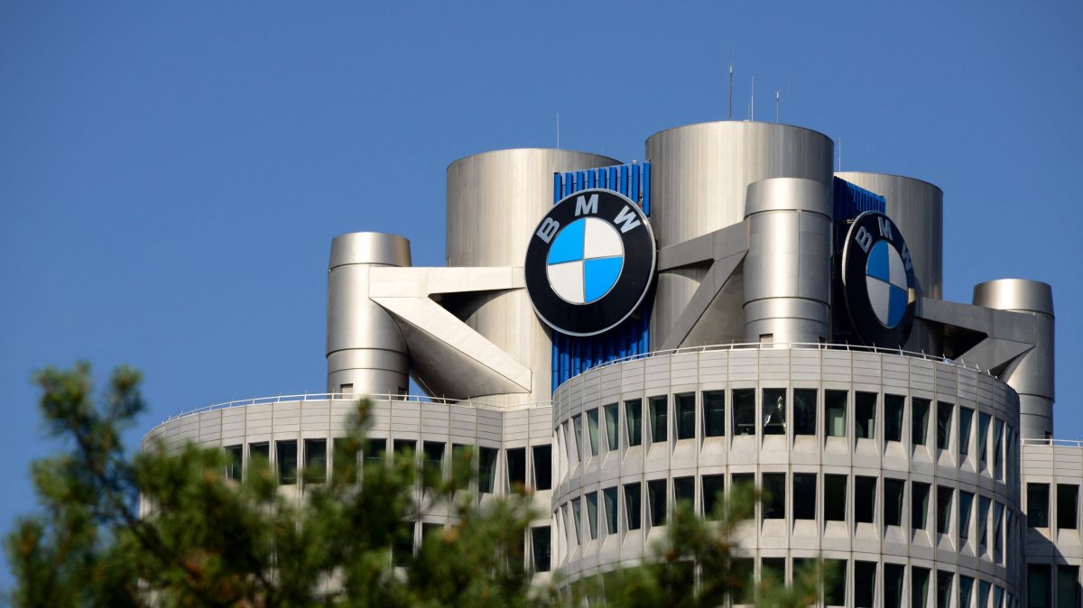 The company's logo is seen atop the so-called BMW tower, the global corporate headquarters of German carmaker BMW, Munich, southern Germany, July 16, 2026. (AFP Photo)