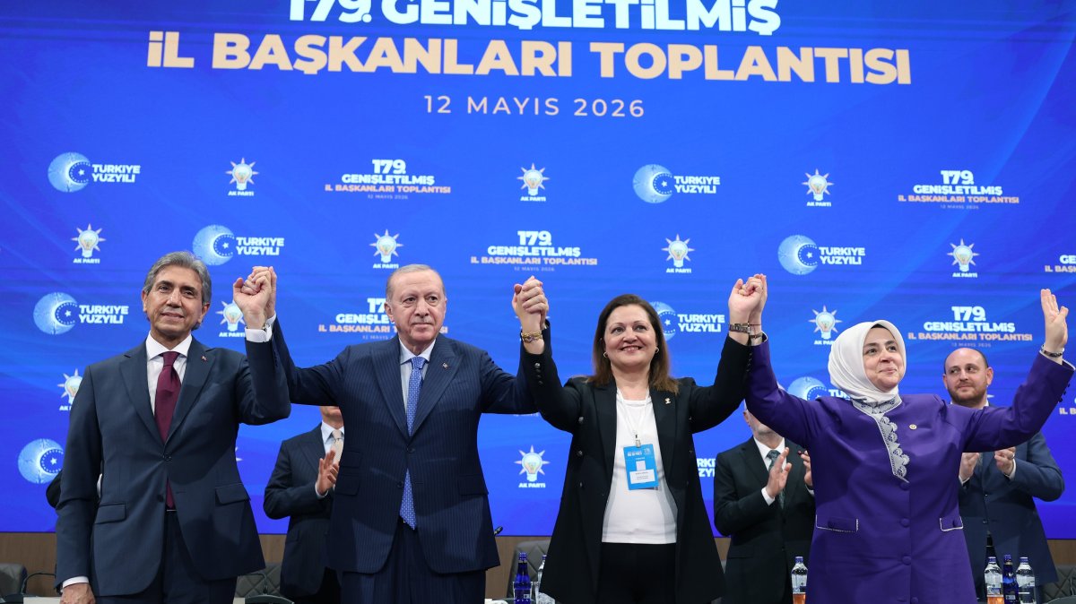 President Recep Tayyip Erdoğan poses with Afyon Mayor Burcu Köksal (C), who joined the AK Party from the CHP, Ankara, Türkiye, May 12, 2026. (AA Photo)
