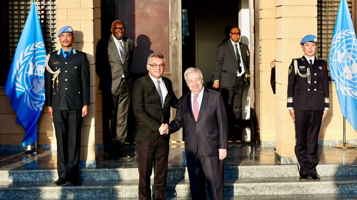Turkish Cypriot President Tufan Erhürman and U.N. Secretary-General Antonio Guterres shake hands at the U.N. buffer zone in Nicosia (Lefkoşa), Cyprus, July 28, 2026. (AA Photo)