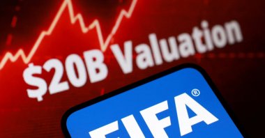 The FIFA logo, words "$20B Valuation" and rising stock graph are seen in this illustration taken, July 28, 2026. (Reuters Photo)