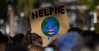Supporters of the United Kingdom Student Climate Network (UKSCN) march through Westminster during a climate protest, London, England, U.K., Nov, 5, 2026. (Getty Images Photo)