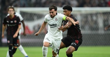 Beşiktaş's Orkun Kökçü (L) and Midtjylland's Pedro Bravo in action during the UEFA Europa League second qualifying round match against Midtjylland, Istanbul, Türkiye, July 23, 2026. (AA Photo)