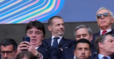 UEFA President Aleksander Ceferin (C) on the tribune before the Champions League final match between Paris Saint-Germain and Arsenal, Budapest, Hungary, May 30, 2026. (AP Photo)