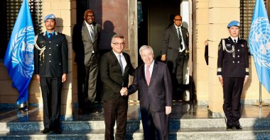 Turkish Cypriot President Tufan Erhürman and U.N. Secretary-General Antonio Guterres shake hands at the U.N. buffer zone in Nicosia (Lefkoşa), Cyprus, July 28, 2026. (AA Photo)