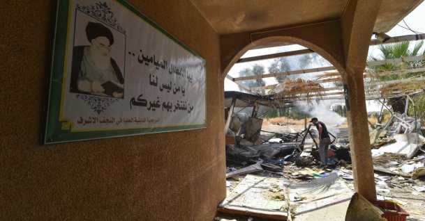 A man inspects the damage at the site of a strike in Bartalla in the Nineveh province, northern Iraq, July 29, 2026. (AFP Photo)