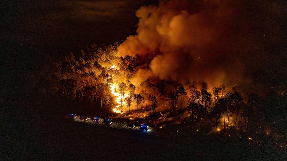 A firefighter crew battles a fire near Le Porge, southwestern France, July 29, 2026. (EPA Photo)