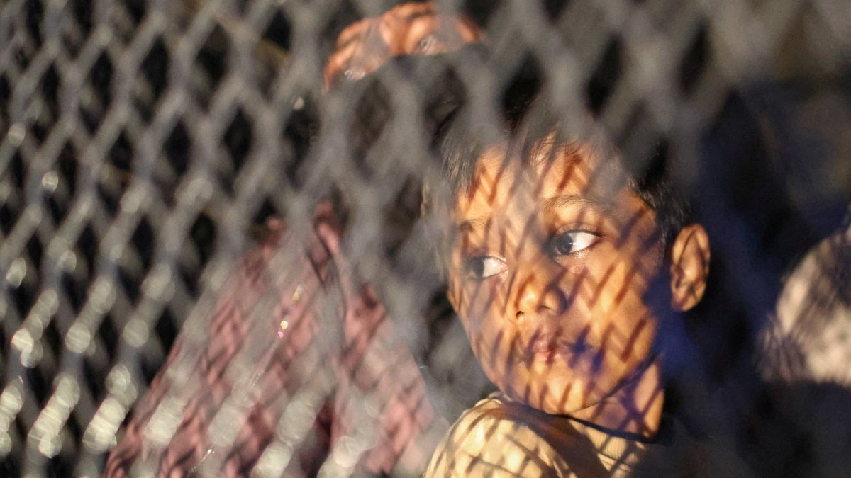 Rohingya refugees sit inside a truck as they are taken away by police, in front of the office of the U.N. Refugee Agency, after being evicted from their homes in Kuala Lumpur, Malaysia, July 27, 2026. (Reuters Photo)