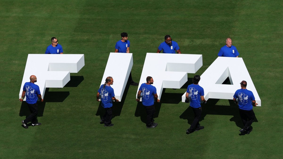 Pitch staff carries the FIFA logo on the pitch before the FIFA World Cup 2026 final, New Jersey, U.S., July 19, 2026. (Reuters Photo)