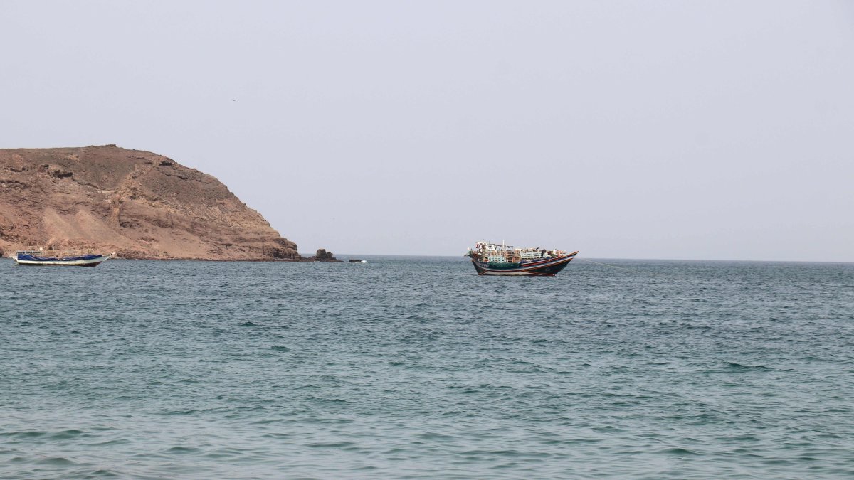 A photo taken from the Yemeni coast southwest of the city of Taiz, shows boats floating at Bab al-Mandab Strait, in the Red Sea, on July 24, 2026. (AFP Photo)
