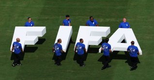 Pitch staff carries the FIFA logo on the pitch before the FIFA World Cup 2026 final, New Jersey, U.S., July 19, 2026. (Reuters Photo)