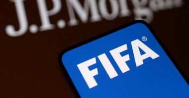 The FIFA and J.P.Morgan logos are seen in this illustration taken, July 28, 2026. (Reuters Photo)