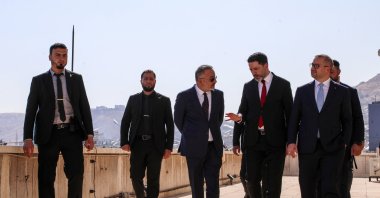 Central Bank of the Republic of Türkiye Gov. Fatih Karahan (R) and Türkiye's Ambassador to Syria Nuh Yılmaz (3rd L) are welcomed by Syrian officials during their visit to Damascus, Syria, July 30, 2026. (AA Photo)