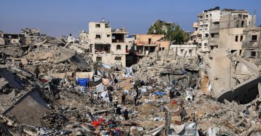 Palestinians inspect the site of Wednesday's Israeli strike on a house in Gaza City, July 30, 2026. (Reuters Photo)