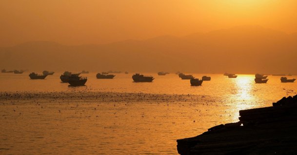 Vessels are at the Strait of Hormuz, as seen from Musandam, Oman, June 16, 2026. (Reuters Photo)