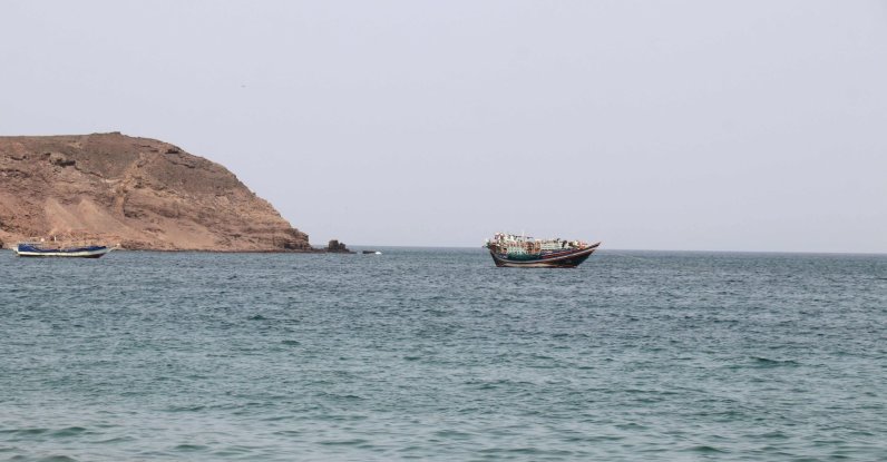 A photo taken from the Yemeni coast southwest of the city of Taiz, shows boats floating at Bab al-Mandab Strait, in the Red Sea, on July 24, 2026. (AFP Photo)