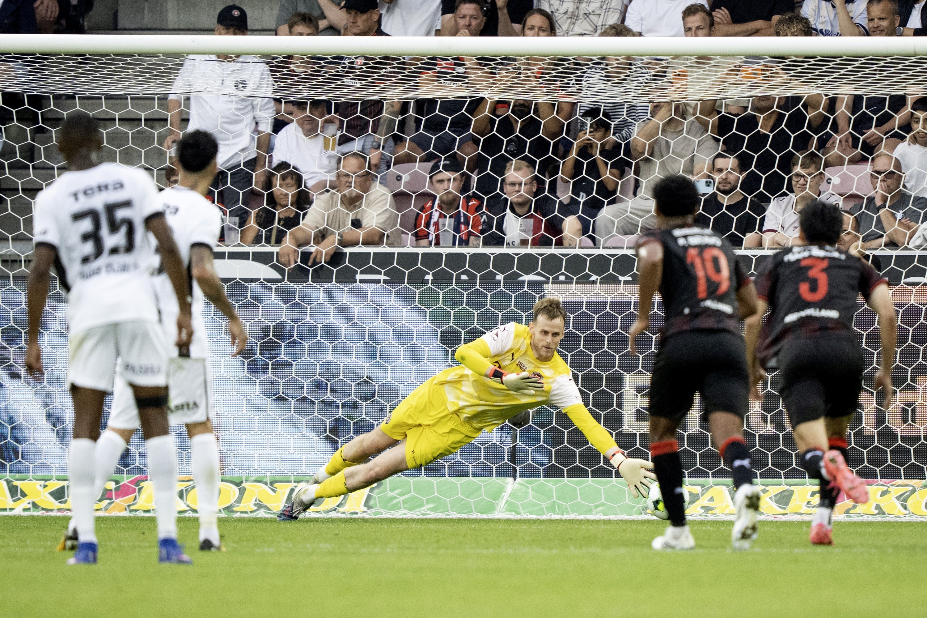 Beşiktaş's Orkun Kökçü shoots from the spot during the UEFA Europa League qualification match against FC Midtjylland at MCH Arena, Herning, Denmark, July 30, 2026. (EPA Photo)