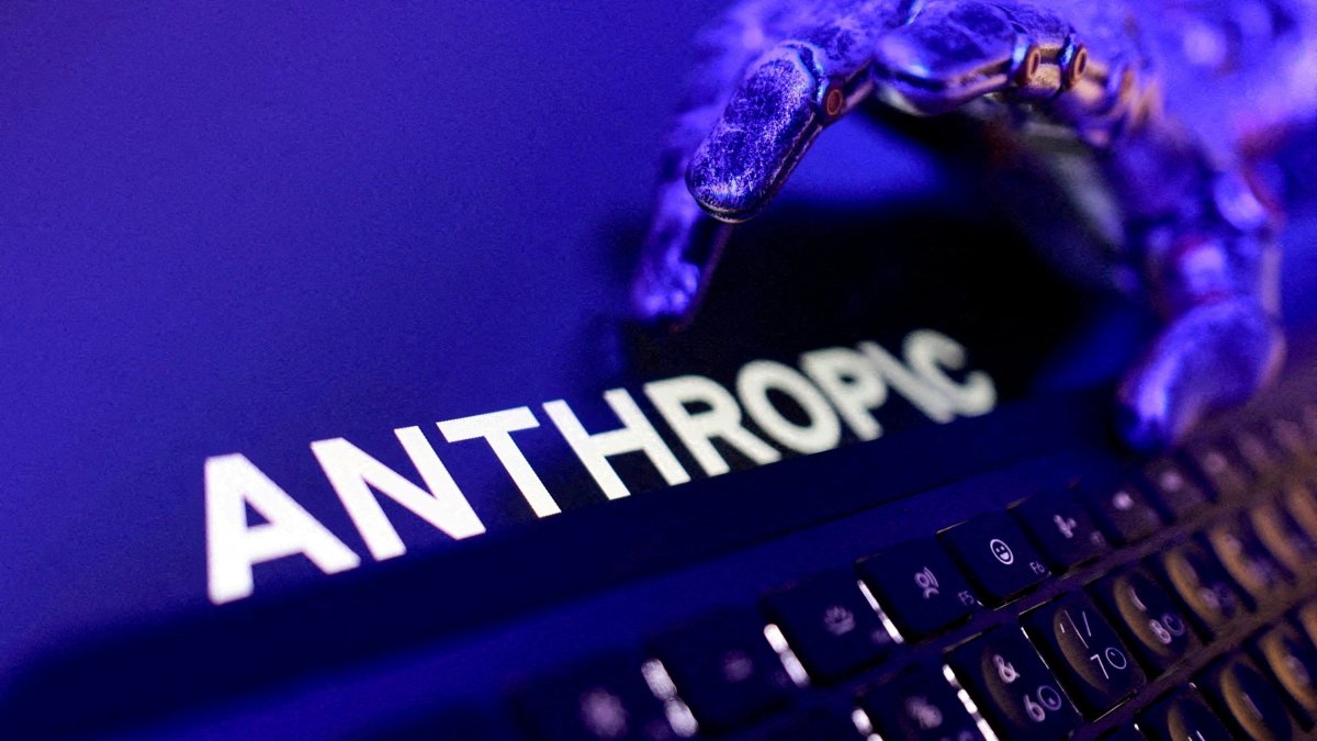 Anthropic logo, a keyboard, and a robotic hand in this illustration created June 5, 2026. (Reuters Photo)