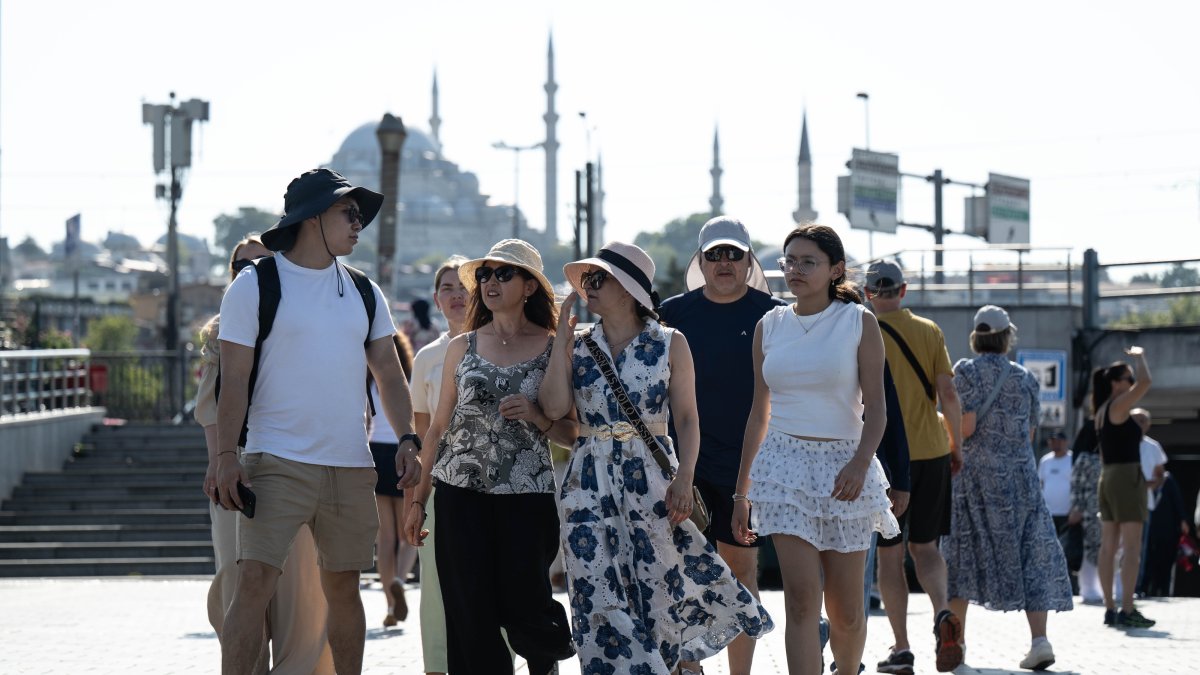 Tourists walk in the famous Eminönü neighborhood, Istanbul, Türkiye, July 28, 2026. (AA Photo)