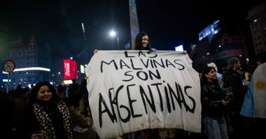 Argentina's fans hold a banner reading "The Malvinas are Argentine" as they gather at the Obelisk, Buenos Aires, Argentina, July 19, 2026. (AFP Photo)