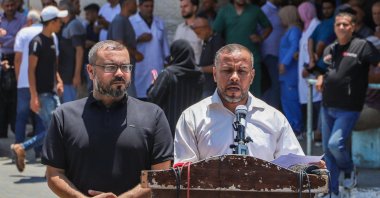 Ismail al-Thawabta (R), head of Hamas' government media office, addresses a press conference at the Al-Aqsa Hospital in Deir al-Balah, Gaza Strip, Palestine, July 6, 2026. (EPA Photo)