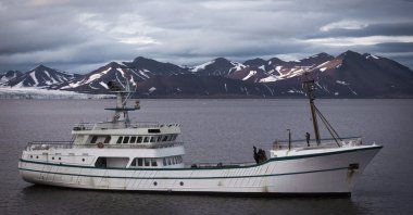 The research vessel carrying the 6th National Arctic Scientific Research Expedition scientific team sails through Arctic waters, July 14, 2026. (AA Photo)