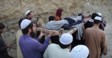 Rescue workers and locals carry the body of a victim after a coal mine blast on the outskirts of Quetta, Pakistan, July 30, 2026. (EPA Photo)