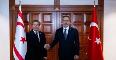 Foreign Minister Hakan Fidan shakes hands with TRNC Prime Minister Ünal Üstel in Ankara, July 31, 2026. (IHA Photo)