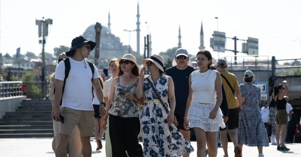 Tourists walk in the famous Eminönü neighborhood, Istanbul, Türkiye, July 28, 2026. (AA Photo)