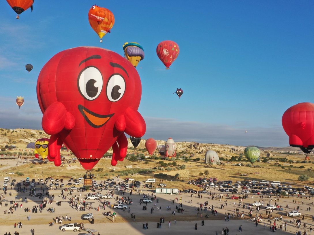Hot air balloons float above Cappadocia during the International Cappadocia Hot Air Balloon Festival, Nevşehir, central Türkiye, July 31, 2026. (AA Photo)