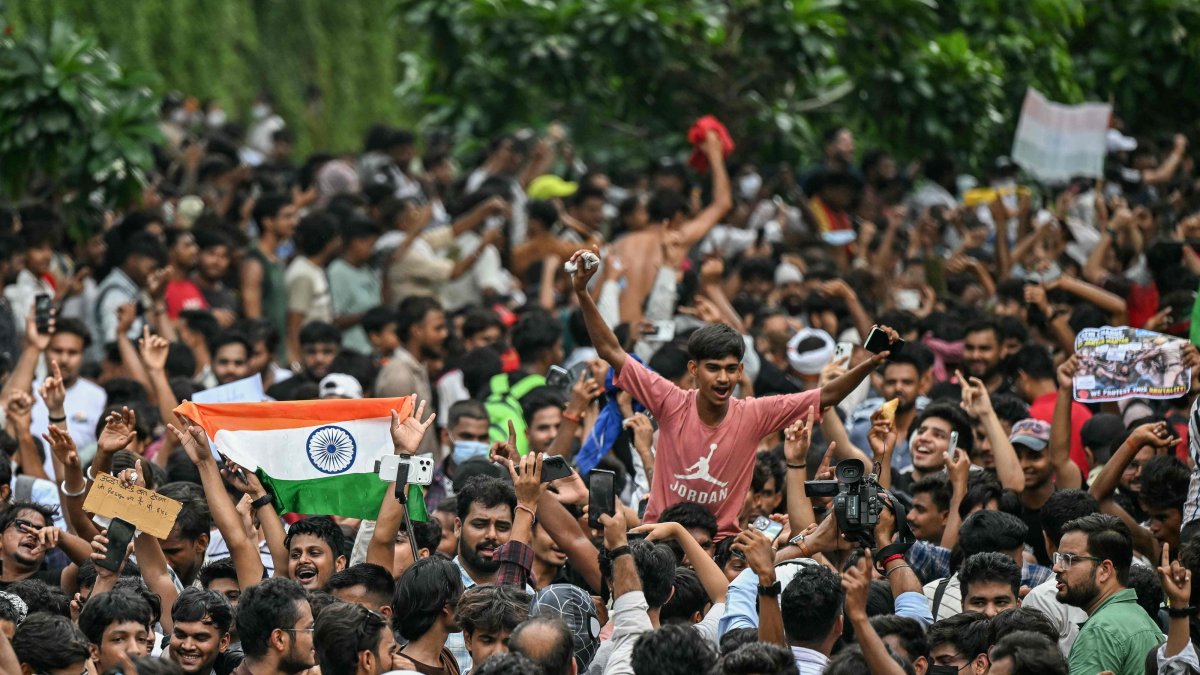 Cockroach Janta Party (CJP) supporters celebrate the resignation of India's Education Minister Dharmendra Pradhan at Jantar Mantar amid the ongoing protests over alleged NEET exam irregularities, New Delhi, India, July 25, 2026. (AFP Photo)