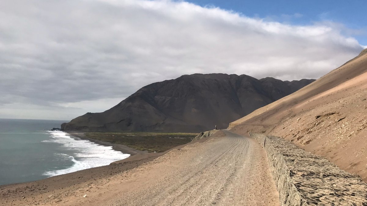 This photo provided by Bernardo Arriaza shows the coast where scientists found evidence of ancient smallpox infections, Camarones coast, Northern Chile, Nov. 2, 2018. (AP Photo)