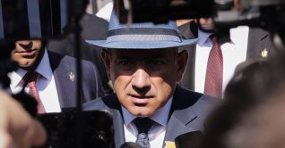 Armenian Prime Minister Nikol Pashinyan speaks to journalists after voting at a polling station during the parliamentary election in Yerevan, Armenia, Sunday, June 7, 2026. (AP Photo/Anthony Pizzoferrato)