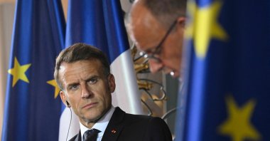 French President Emmanuel Macron (L) looks at German Chancellor Friedrich Merz during a joint press conference, Bruehl, Germany, July 17, 2026. (AFP Photo)