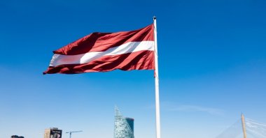 A Latvian flag flutters in the wind, Riga, Latvia, May 21, 2023. (Shutterstock Photo)