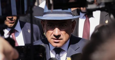 Armenian Prime Minister Nikol Pashinyan speaks to journalists after voting at a polling station during the parliamentary election in Yerevan, Armenia, Sunday, June 7, 2026. (AP Photo/Anthony Pizzoferrato)